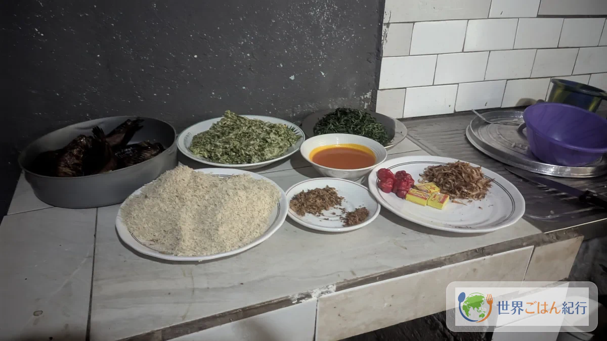 Samen, Blattgemüse und Meeresfrüchte als Zutaten der Egusi-Suppe